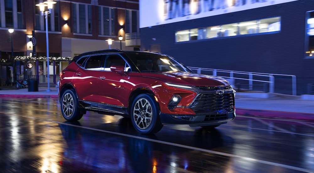 A red 2023 Chevy Blazer RS is shown from the front at an angle after leaving a Chevy dealer near Antelope.
