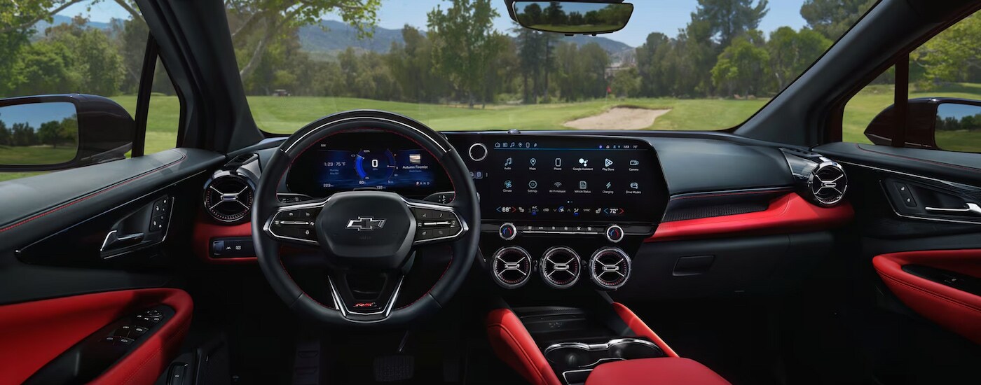 The red and black interior of a 2024 Chevy Blazer EV for sale.