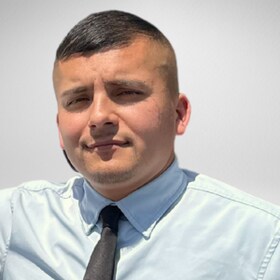 Staff member Adrian Moreno from 9011ecc83b1c