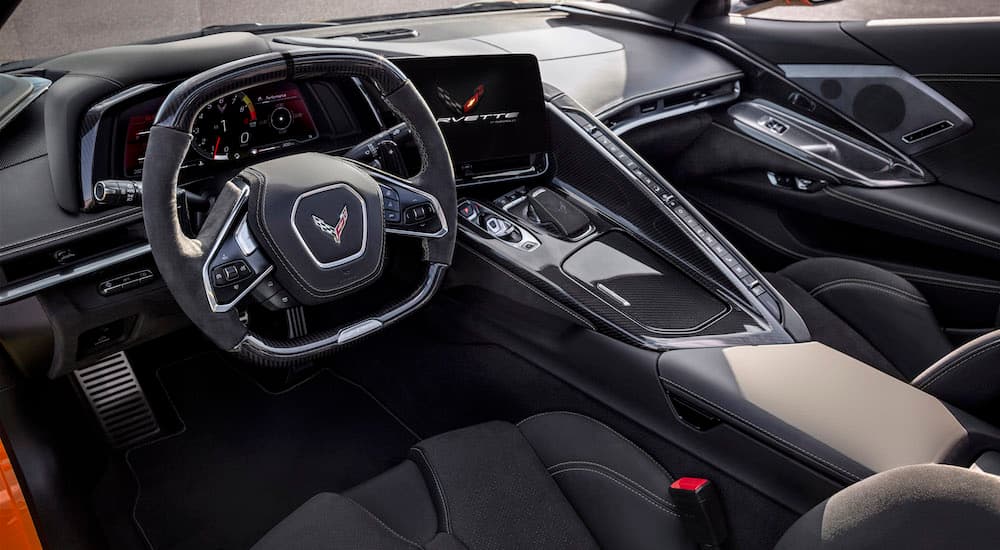 The interior of a 2024 Chevy Corvette Z06 is shown from the passenger side.