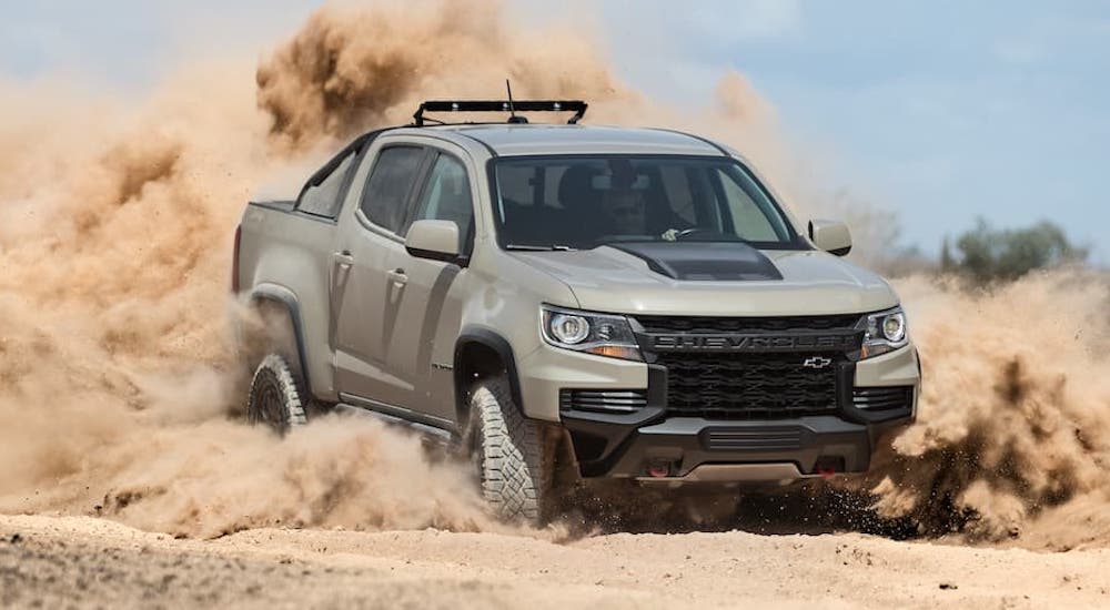 A tan 2020 Chevy Colorado ZR2 is shown from the front at an angle.