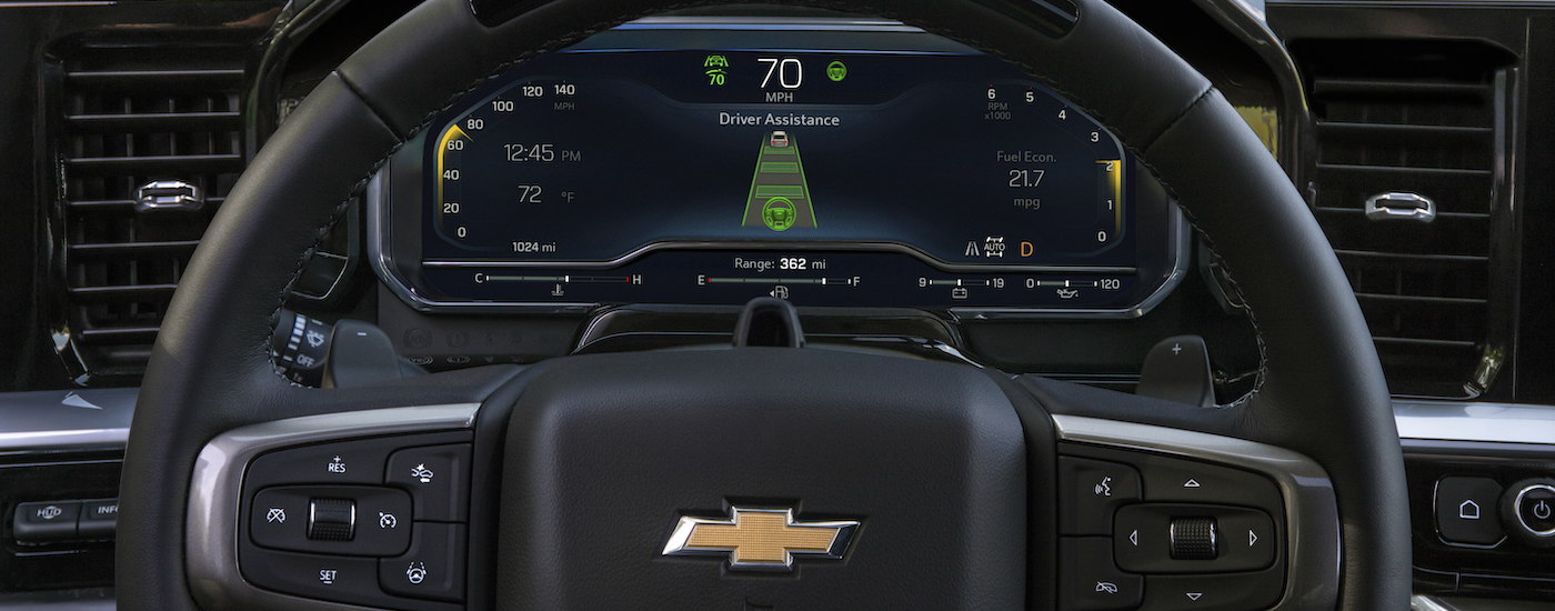 a close up shows the driver assist feature on the gauge of a 2022 Chevy Silverado 1500 High Country.