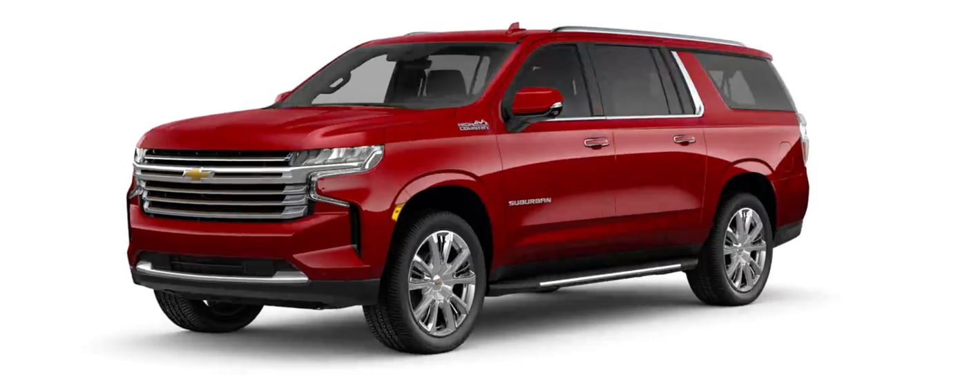 A red 2023 Chevy Suburban High Country is shown angled left.