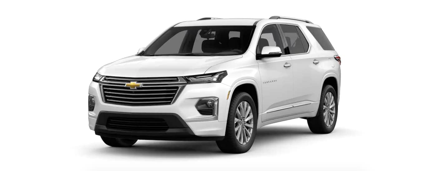  A white 2023 Chevy Traverse is angled left.