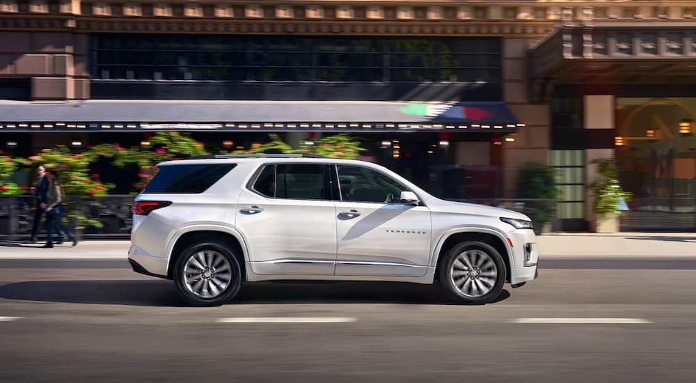A white 2022 Chevy Traverse is shown from the front at an angle.