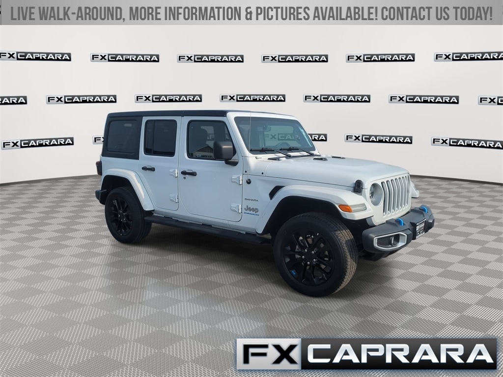 Used 2023 Jeep Wrangler 4xe Sahara 4XE with VIN 1C4JJXP69PW661019 for sale in Alexandria Bay, NY