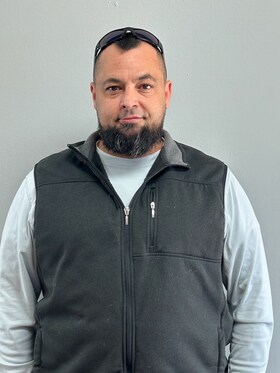 Staff member Cliff Gay  from d8efc7769306