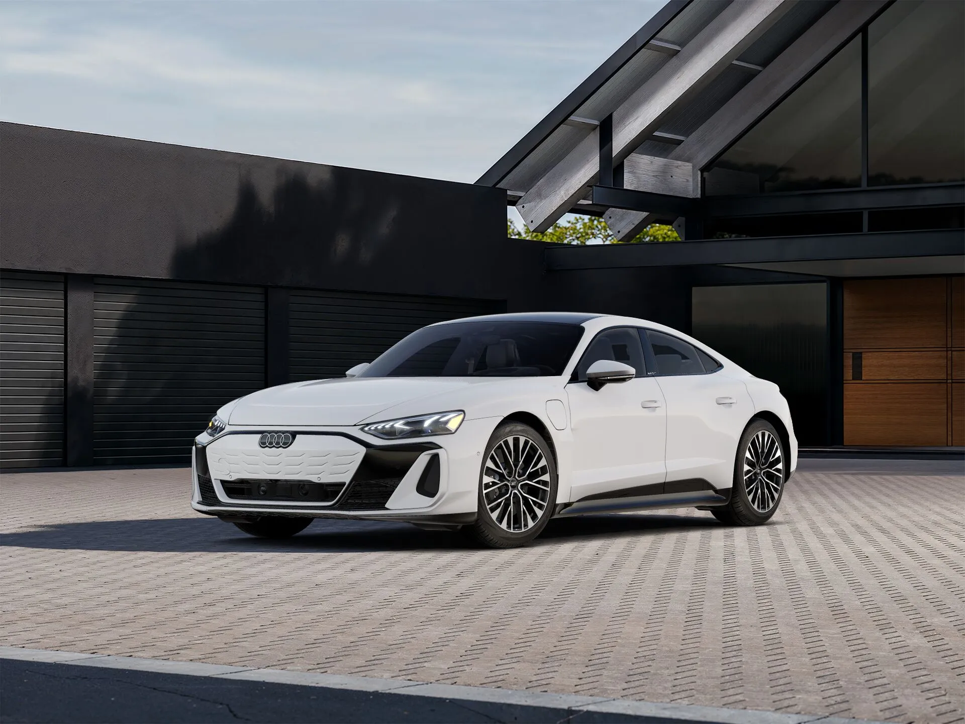 Vue 3/4 avant de la berline électrique de luxe Audi e-tron GT 2025.
