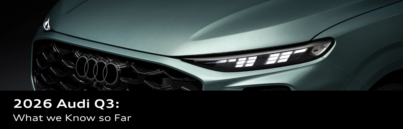 Close-up of the grille and headlamp of the green 2026 Audi Q3, illustrating the model’s design and spec sheet.