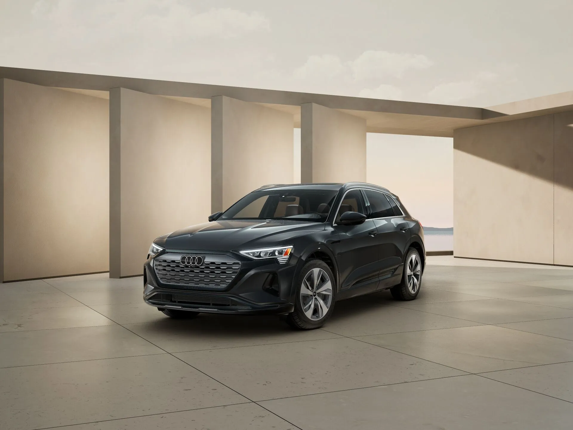 Vue 3/4 avant de l'Audi Q8 e-tron.