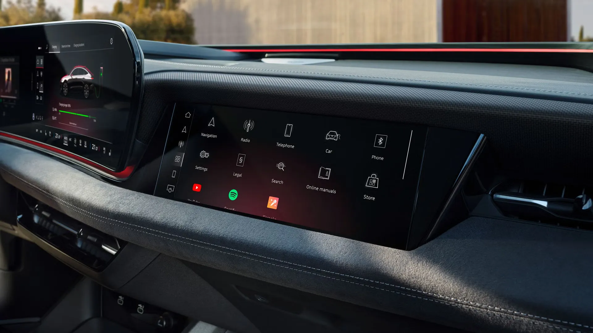 Digital dashboard of the 2025 Audi S6 e-tron with MMI touch screen displaying apps and controls.