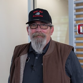 Staff member Larrison Huey from cc68e758645a