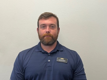 Staff member Austin Scott from 7d648abd7629
