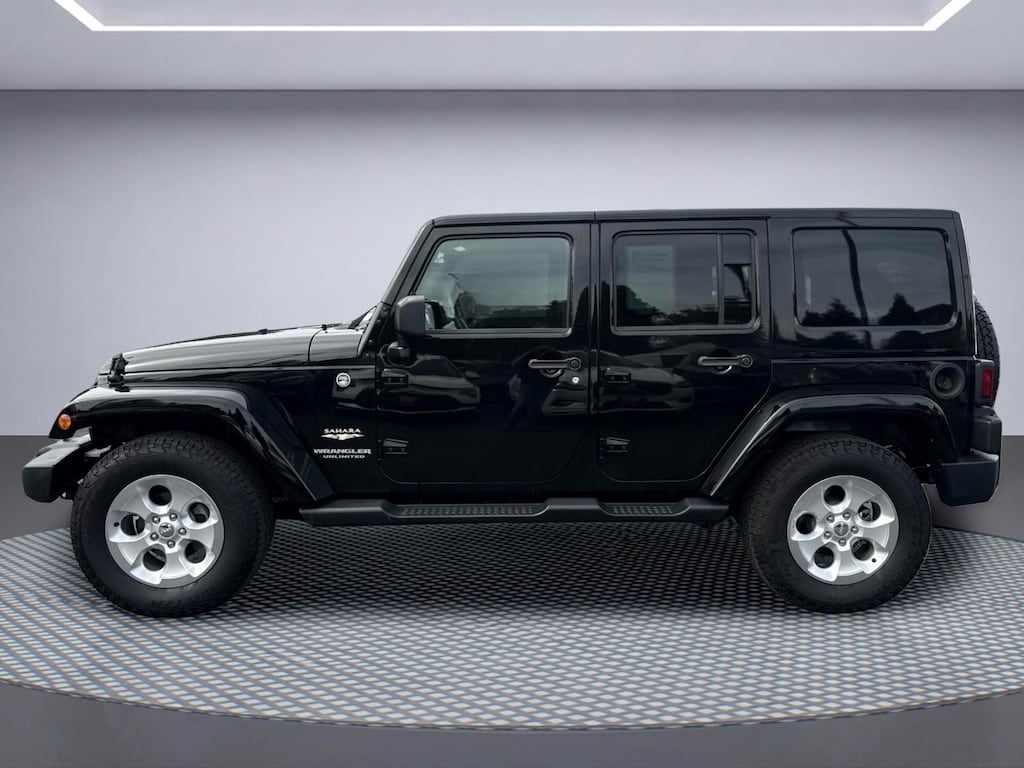 Used 2014 Jeep Wrangler Unlimited Sahara SUV
