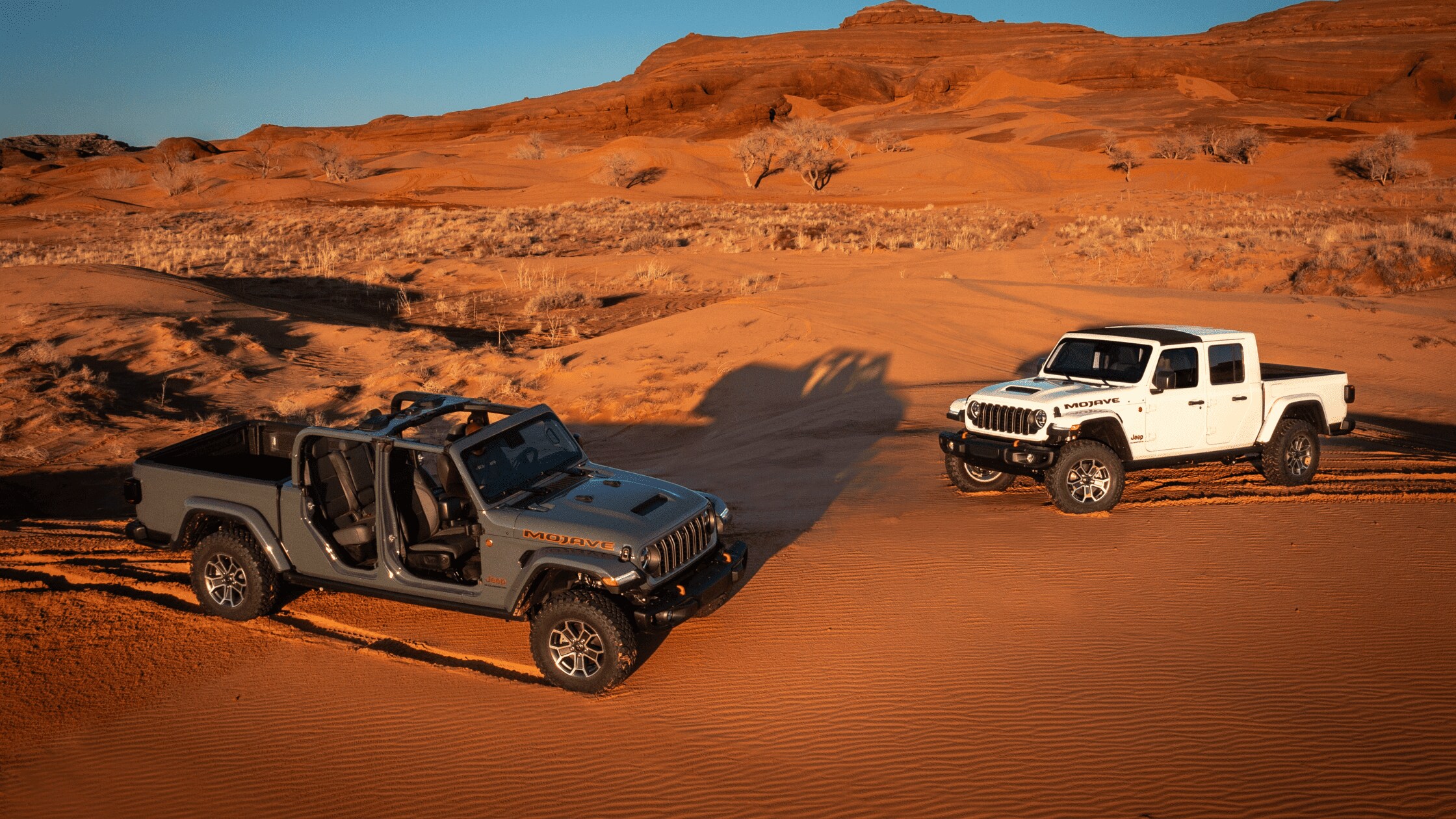 2024 Jeep Gladiator Mojave models exploring sandy desert terrains, demonstrating off-road strength near Fort Myers, FL