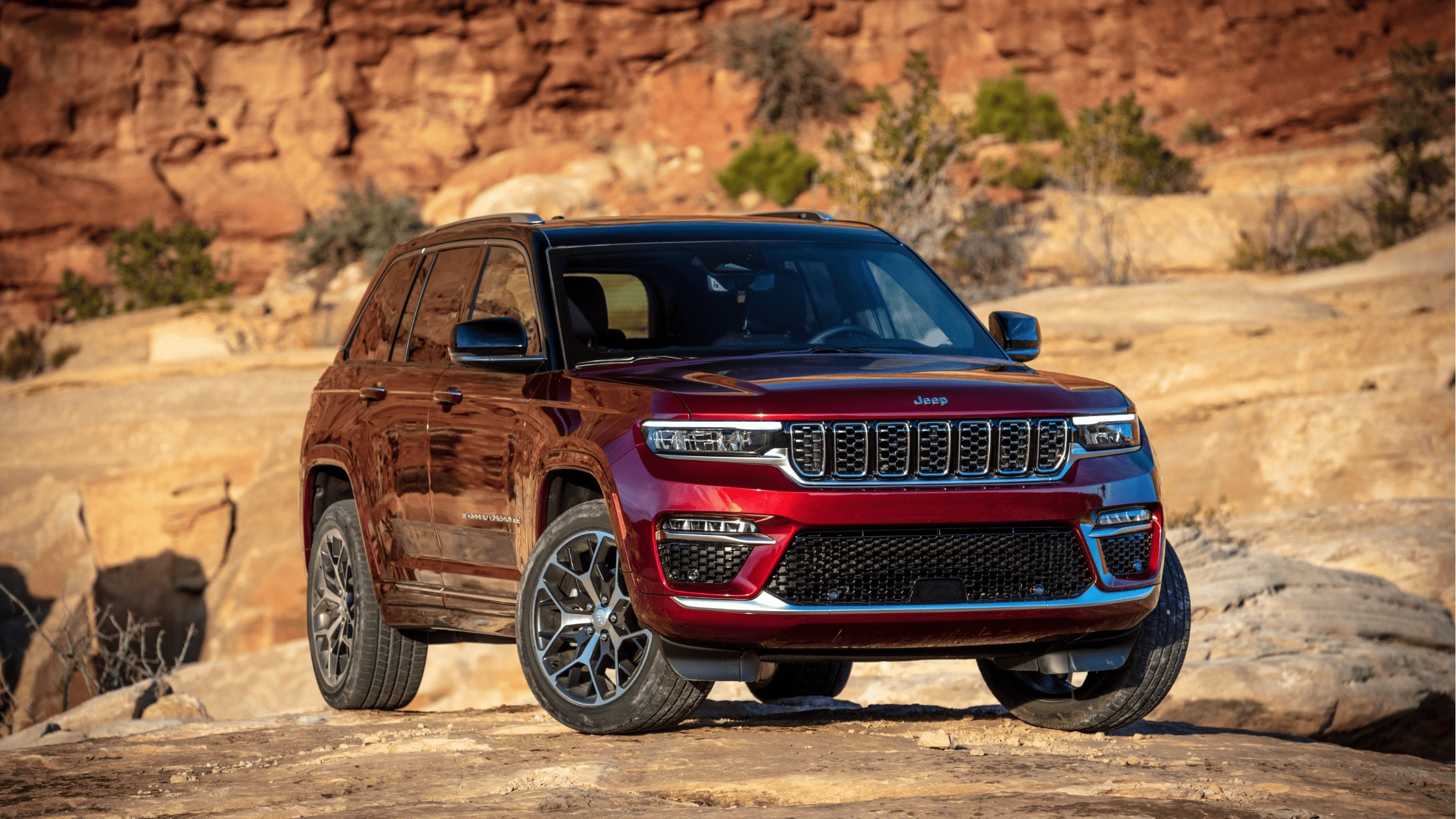 2025 Jeep Grand Cherokee in a rugged desert setting, highlighting its off-road capabilities and luxury SUV design for Fort Myers adventurers.