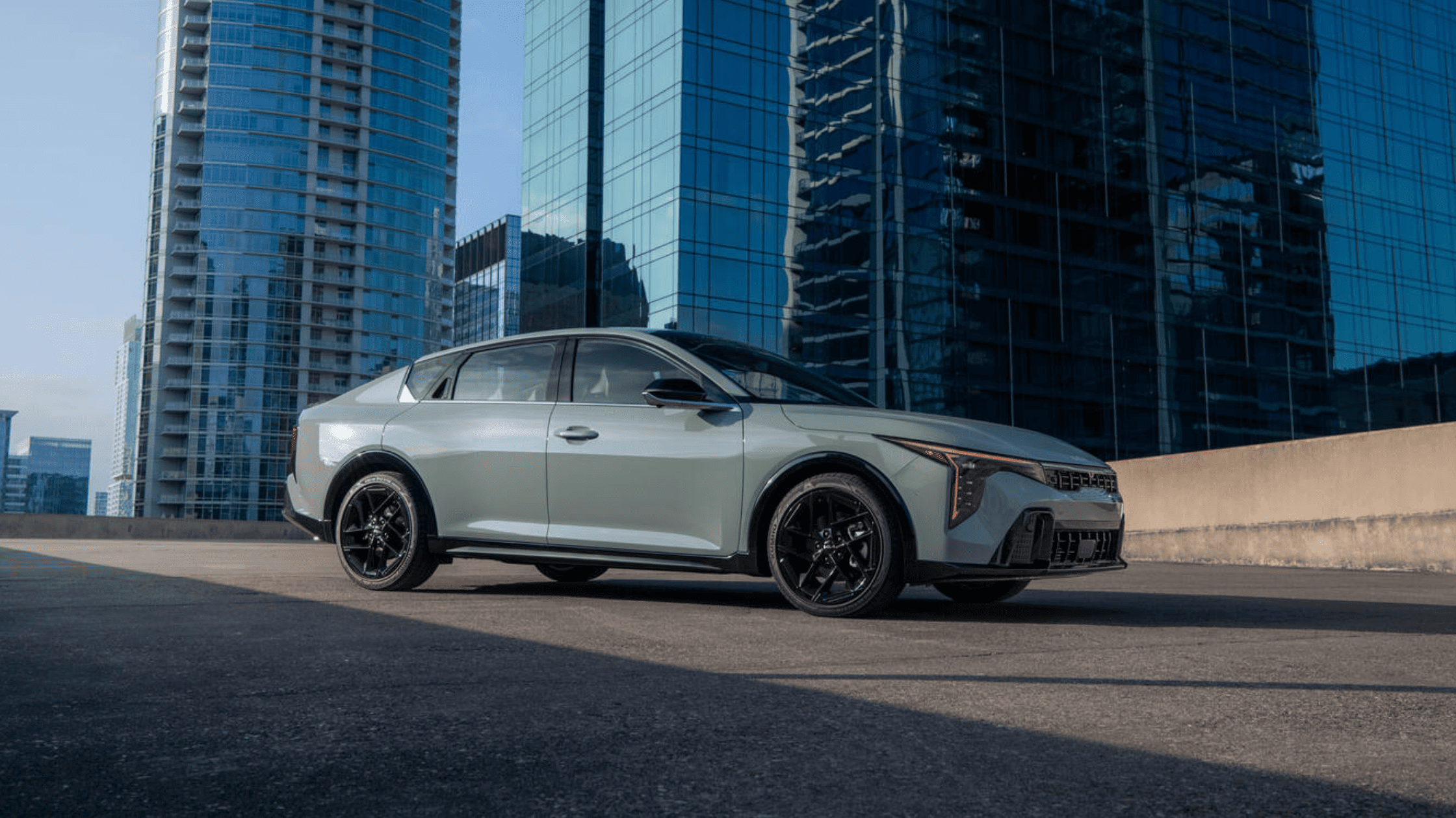 2025 Kia K4 driving near downtown Cape Coral, FL
