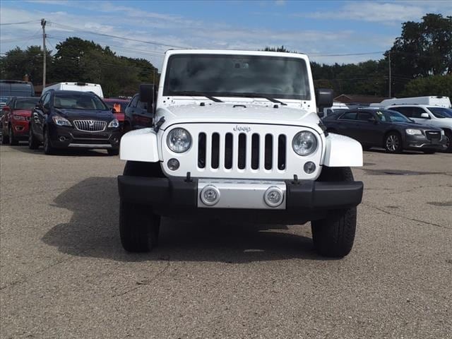 Used 2015 Jeep Wrangler Unlimited Sahara with VIN 1C4BJWEGXFL759874 for sale in Warren, MI