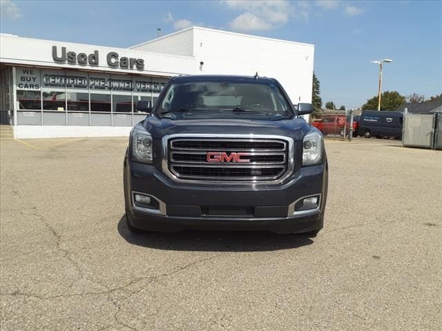 Used 2020 GMC Yukon SLE with VIN 1GKS2AKC0LR237883 for sale in Warren, MI