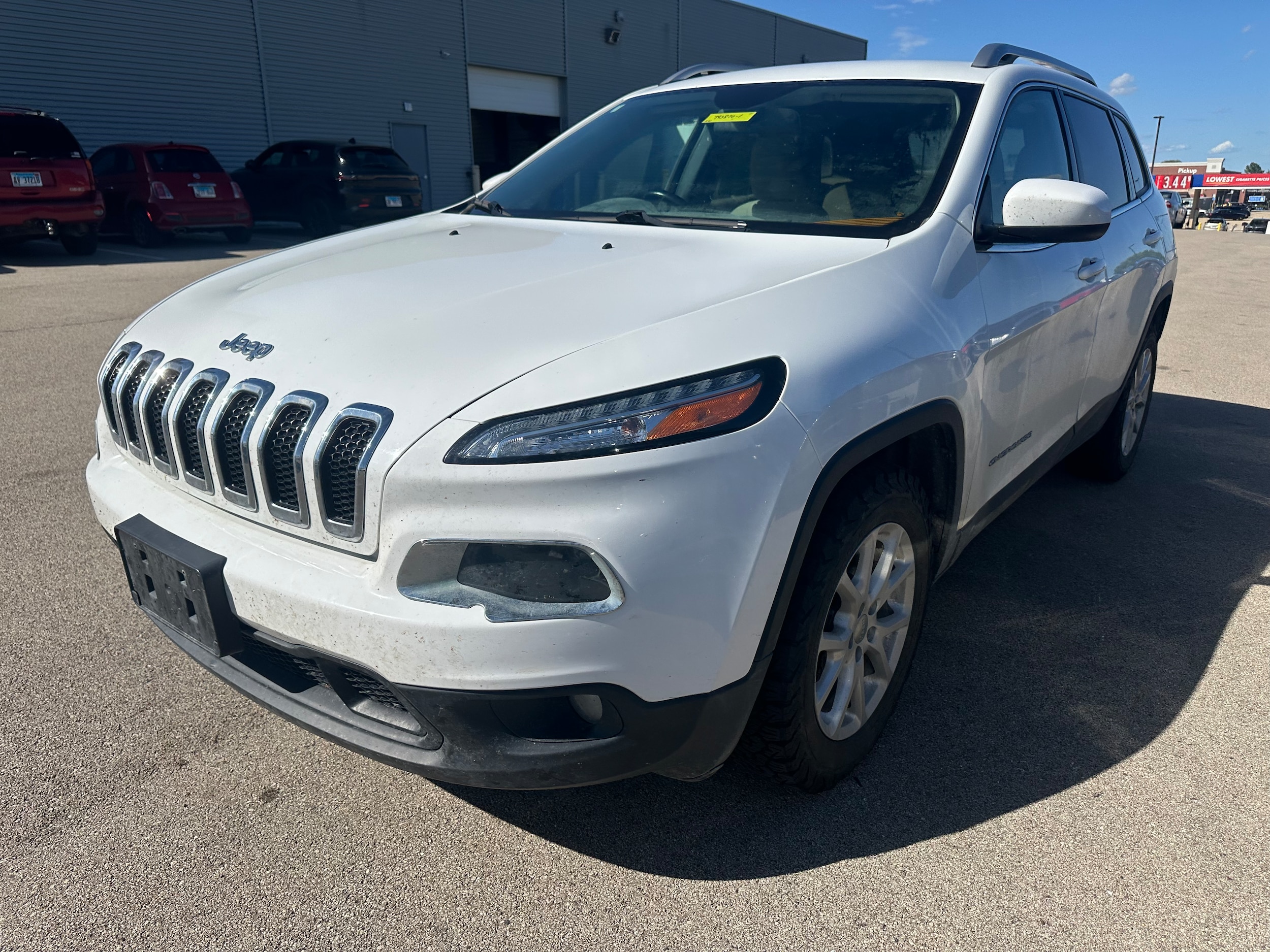 Used 2015 Jeep Cherokee Latitude with VIN 1C4PJMCS7FW793870 for sale in Galena, IL