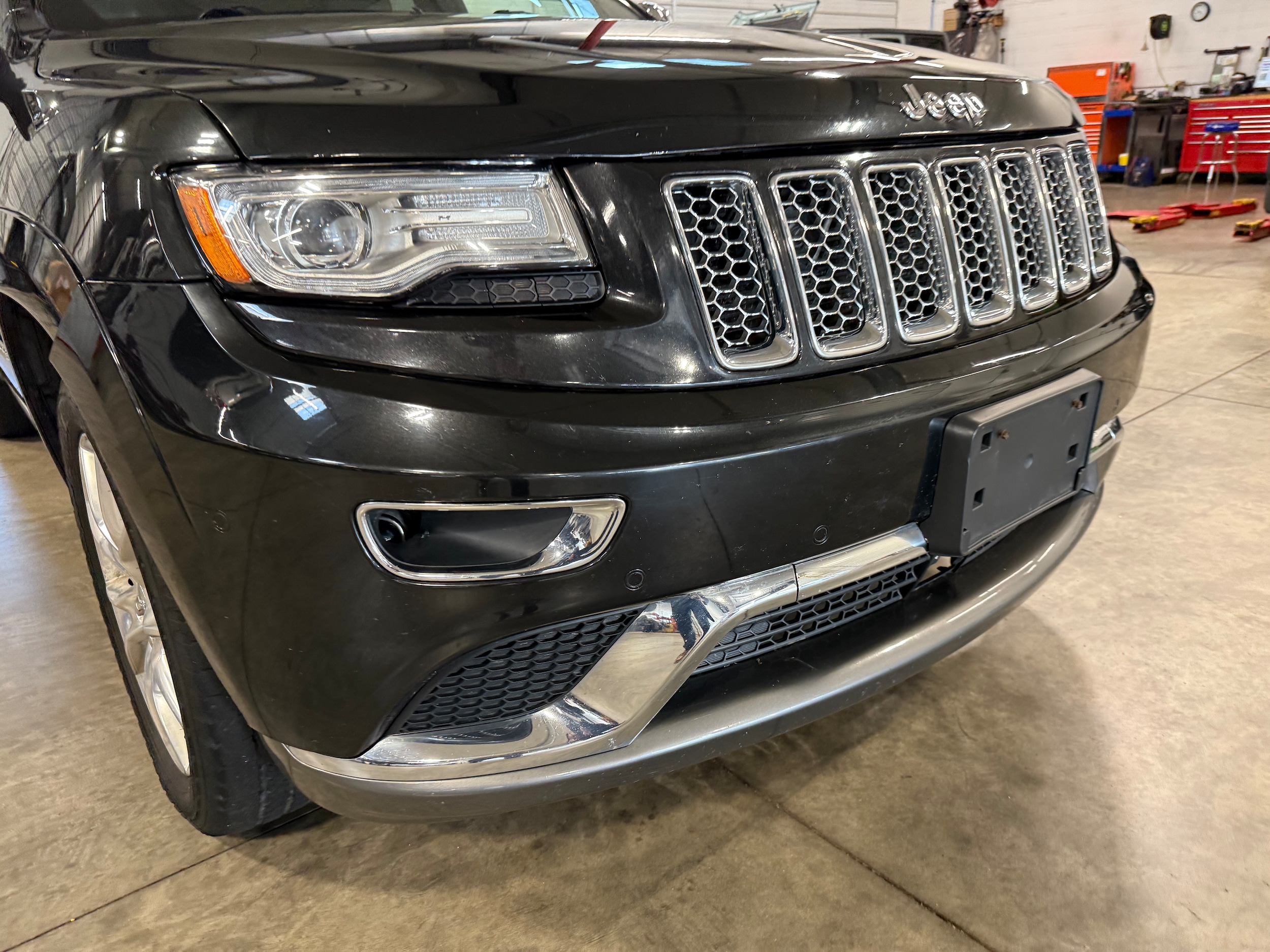 Used 2014 Jeep Grand Cherokee Summit with VIN 1C4RJFJG7EC509317 for sale in Galena, IL