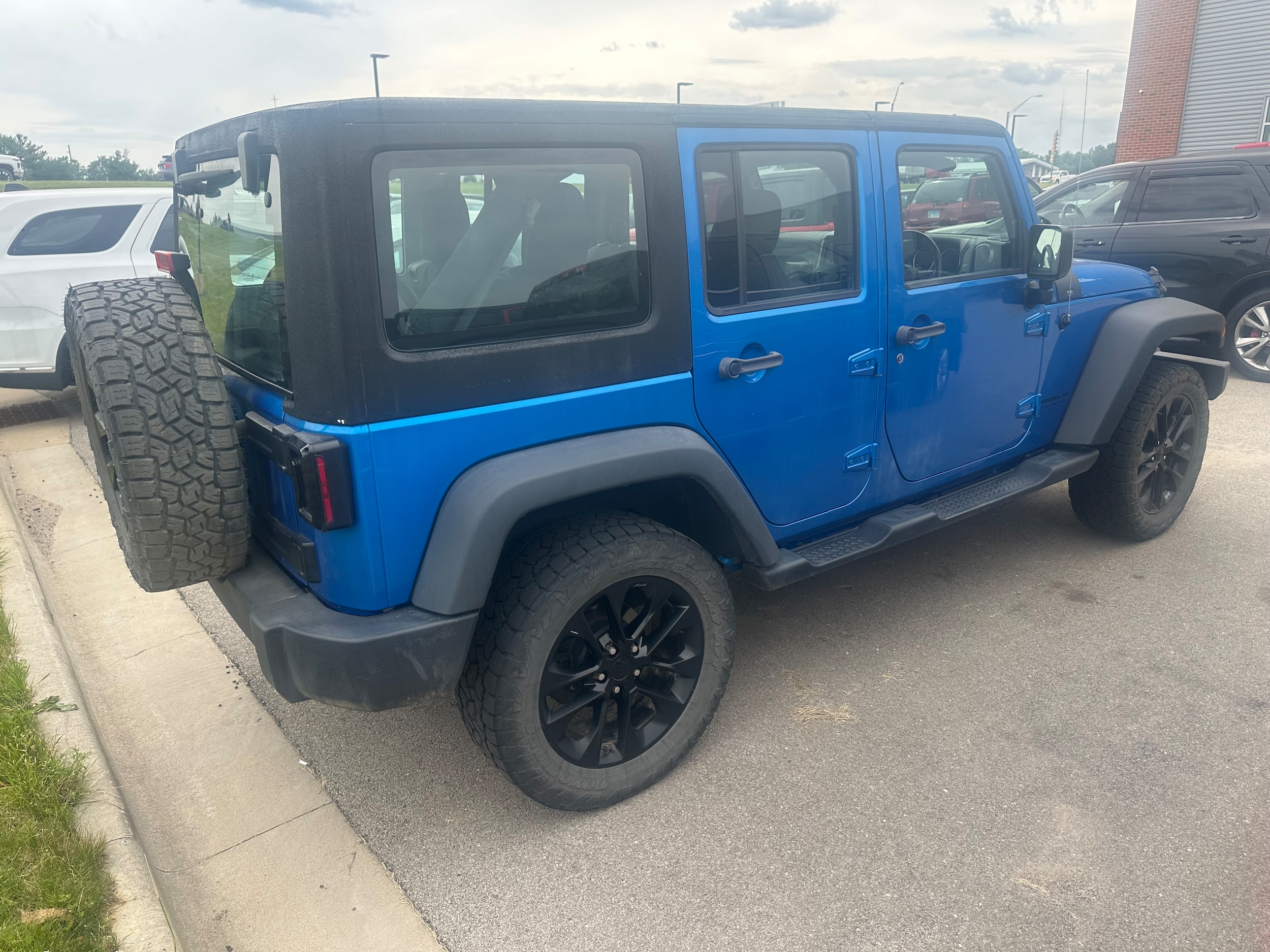 Used 2015 Jeep Wrangler Unlimited Sport with VIN 1C4BJWKG6FL643401 for sale in Galena, IL