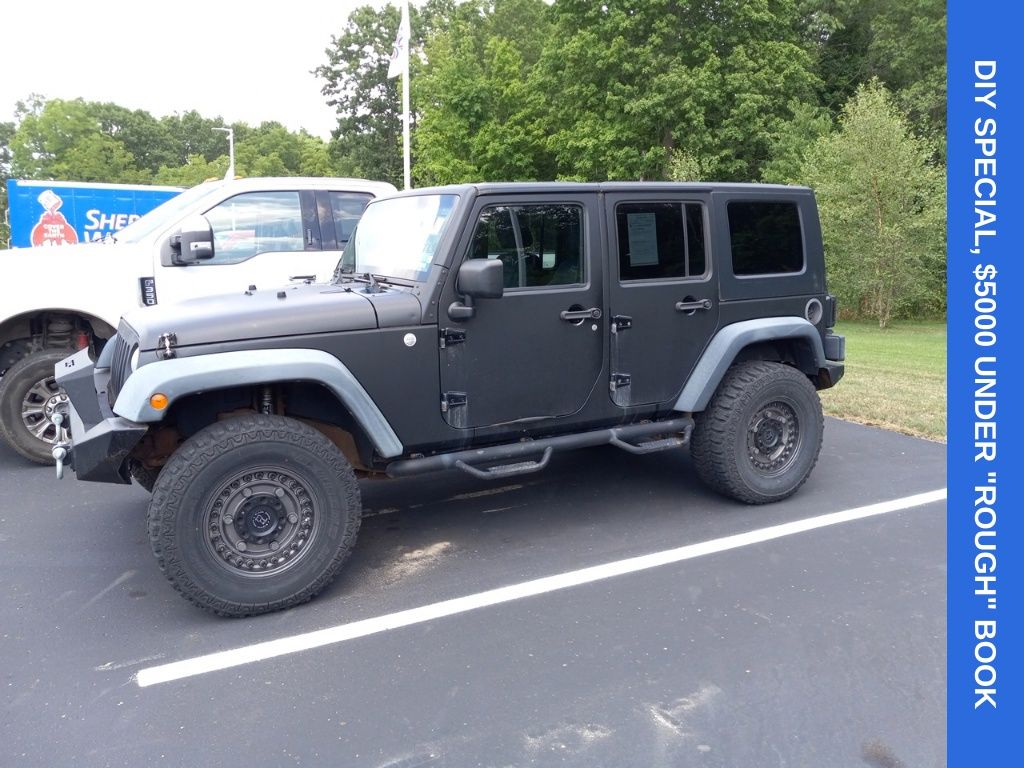 Used 2010 Jeep Wrangler Unlimited Rubicon with VIN 1J4HA6H17AL177977 for sale in Galesburg, MI