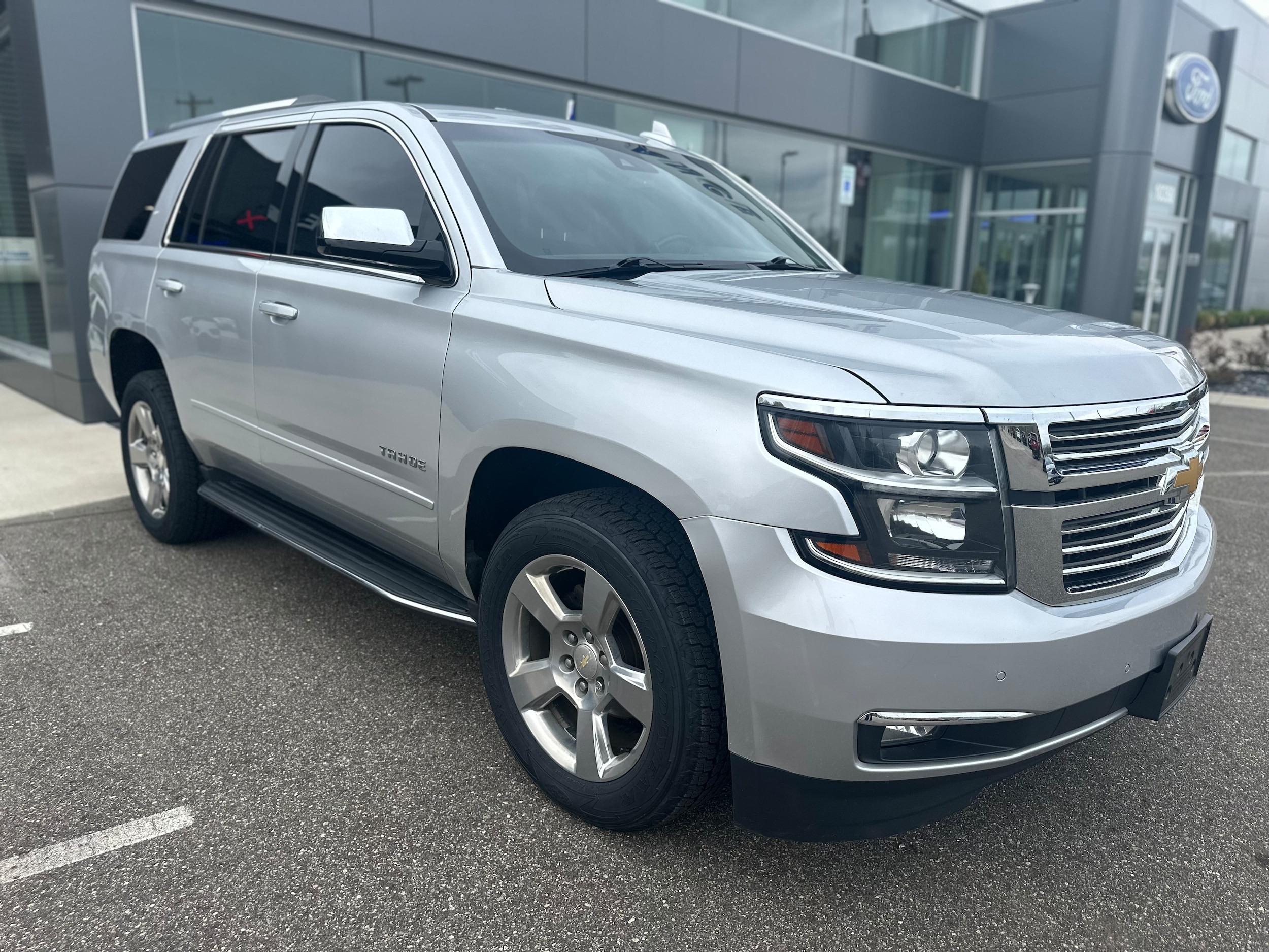 Used 2020 Chevrolet Tahoe Premier with VIN 1GNSKCKC5LR218907 for sale in Galesburg, MI
