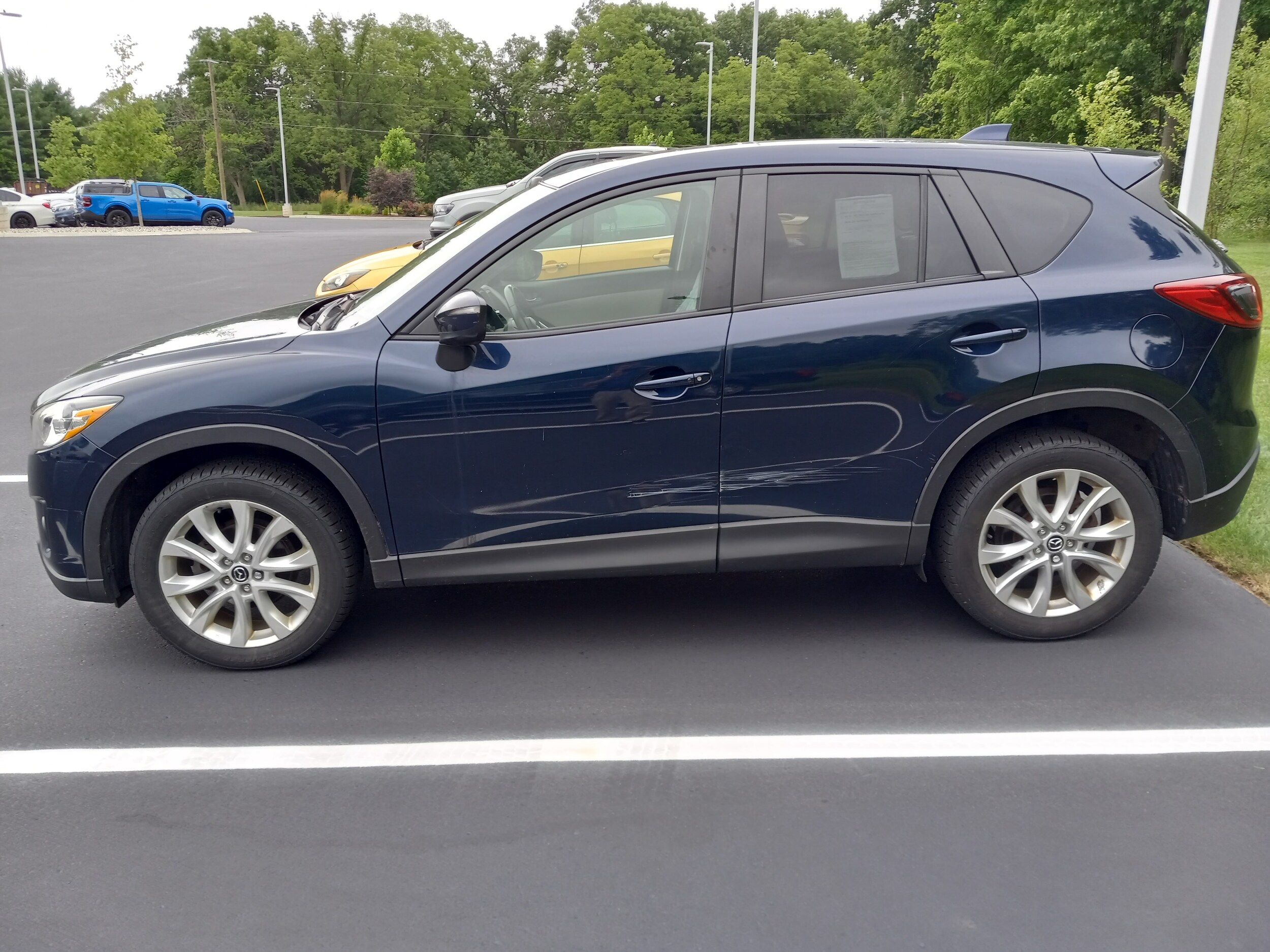 Used 2015 Mazda CX-5 Grand Touring with VIN JM3KE4DY3F0513079 for sale in Galesburg, MI