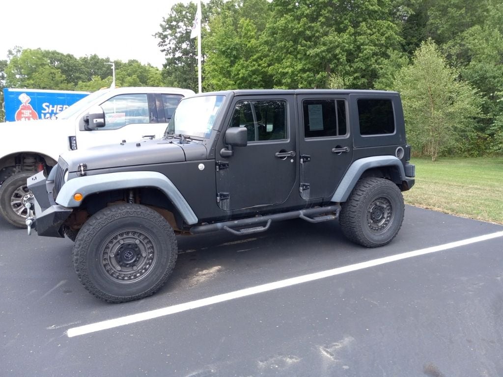 Used 2010 Jeep Wrangler Unlimited Rubicon with VIN 1J4HA6H17AL177977 for sale in Galesburg, MI