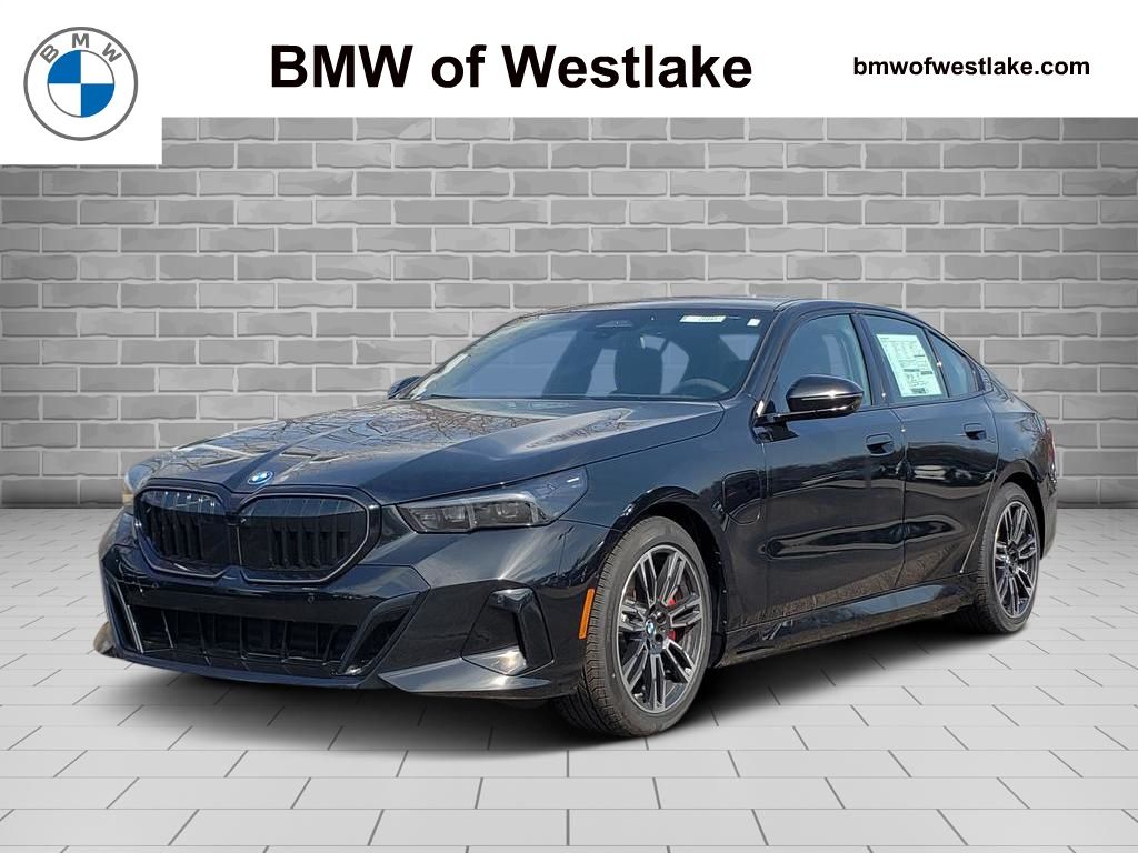 2026 BMW 5 Series 550e xDrive Sedan's photo