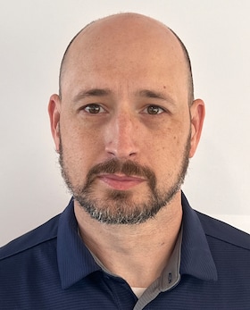 Staff member Derek Reese from ID_b3f2fc425241