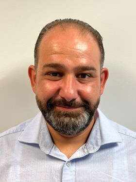 Staff member Woody Tannous from 40351a9159f4