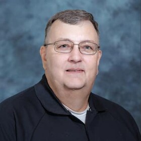 Staff member Ron Baumgartner from ID_b91279a3e8ed