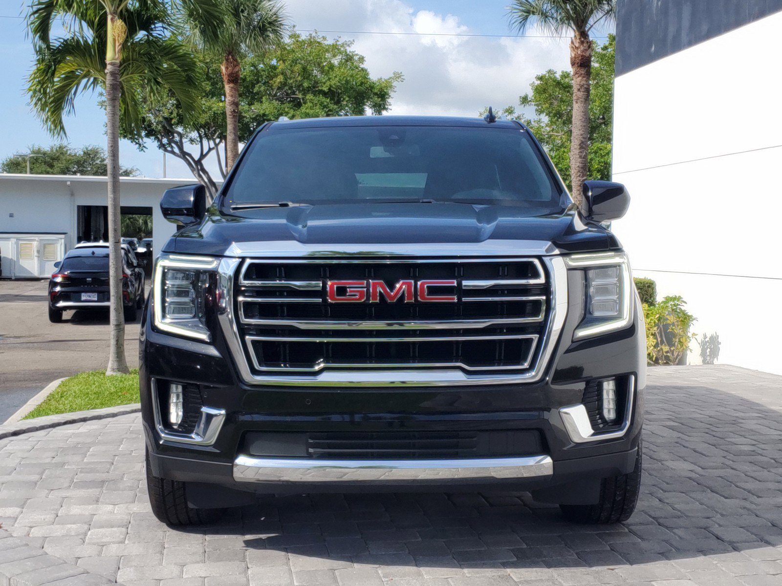 Used 2021 GMC Yukon SLT with VIN 1GKS1BKDXMR173919 for sale in Delray Beach, FL