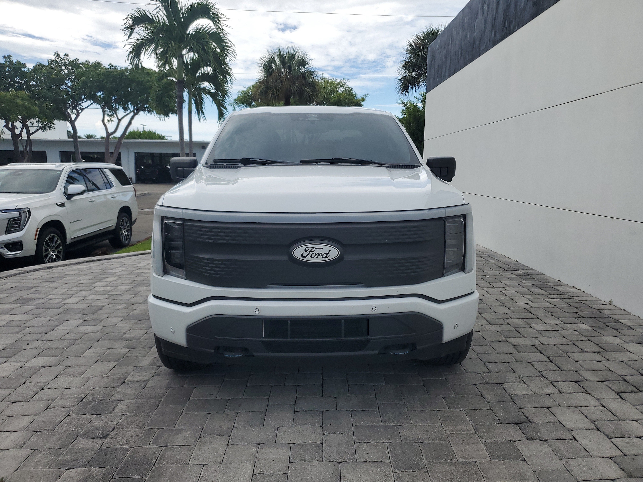 Used 2024 Ford F-150 Lightning Flash with VIN 1FT6W3L78RWG18888 for sale in Delray Beach, FL