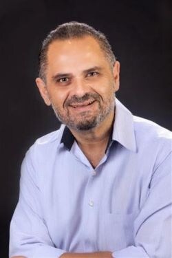Staff member Kassim Salman from ID_f82061