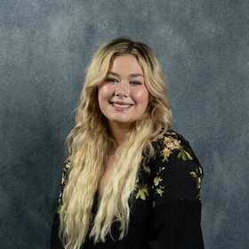 Staff member Addison Moore from ID_020f99c870f9