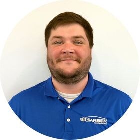Staff member Andrew Hauser from ID_618367