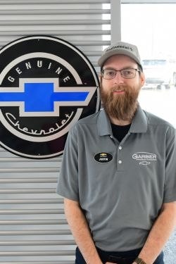 Staff member Justin Hart from ID_cf00bf