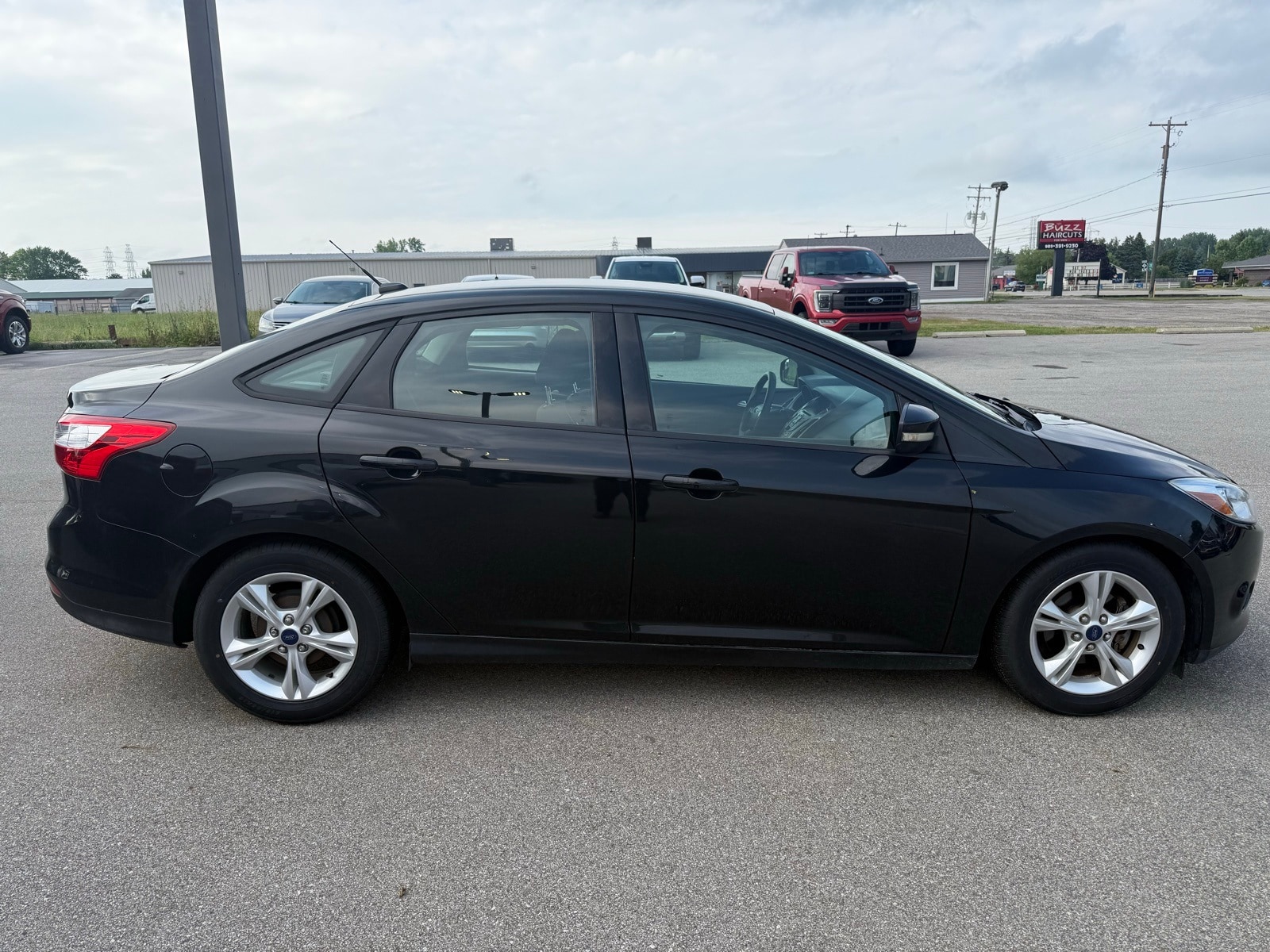 Used 2014 Ford Focus SE with VIN 1FADP3F28EL340340 for sale in Bay City, MI