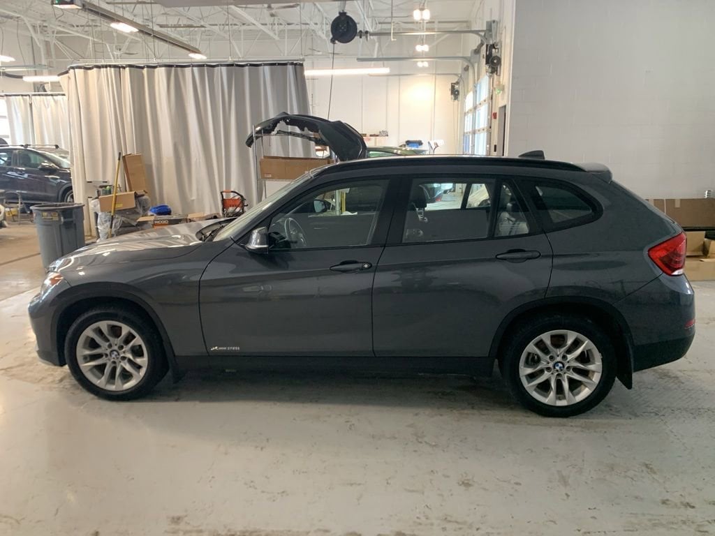 Used 2015 BMW X1 28i with VIN WBAVL1C5XFVY25028 for sale in Rochester, NY