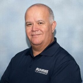 Staff member Luciano Garcia from 6a003691de60