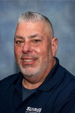 Staff member John Gerovasil from c0441948505c