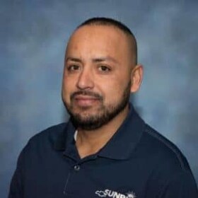 Staff member Javier Guzman from 0968f100b137