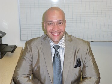 Staff member Eric Rivera from 851c2a18e5de