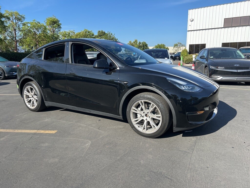 Used 2023 Tesla Model Y Long Range with VIN 7SAYGDEE5PA086492 for sale in Kansas City