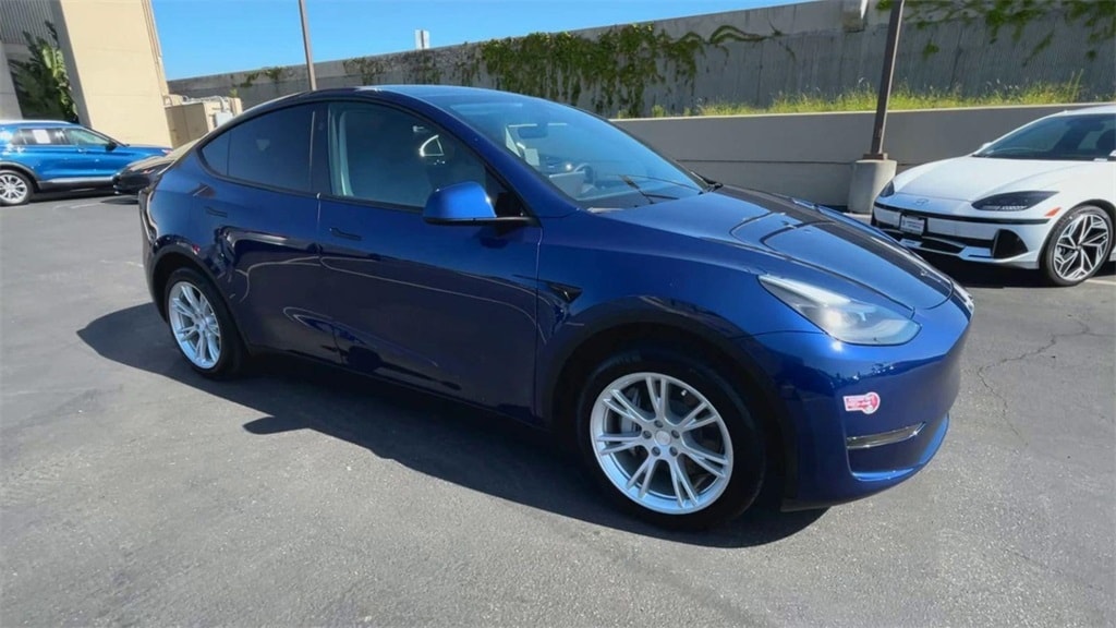 Used 2024 Tesla Model Y Long Range with VIN 7SAYGDED5RF043879 for sale in Garden Grove, CA