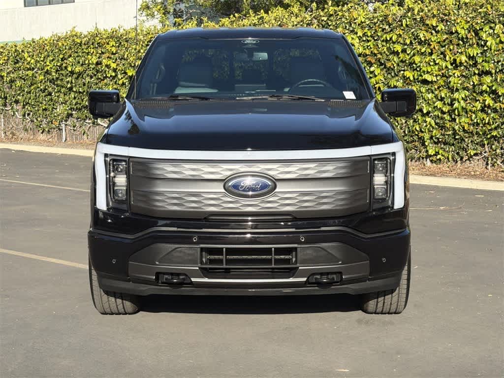 Used 2022 Ford F-150 Lightning Lariat with VIN 1FTVW1EL7NWG15095 for sale in Garden Grove, CA