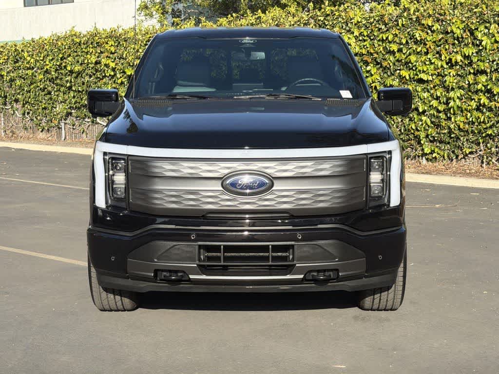 Used 2022 Ford F-150 Lightning Lariat with VIN 1FTVW1EL7NWG15095 for sale in Garden Grove, CA